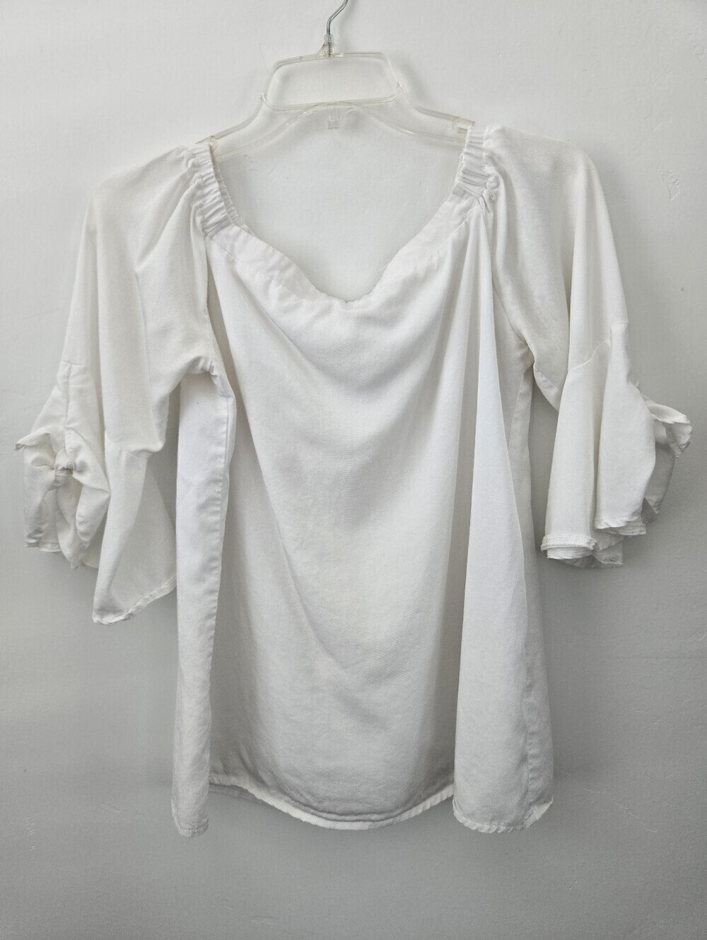 Lost in Lunar white off-the-shoulder top with tied bell sleeves. Size Small.
